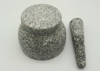 Mortaio e pestello di pietra naturale, mortaio del granito dell'erba e pestello solidi